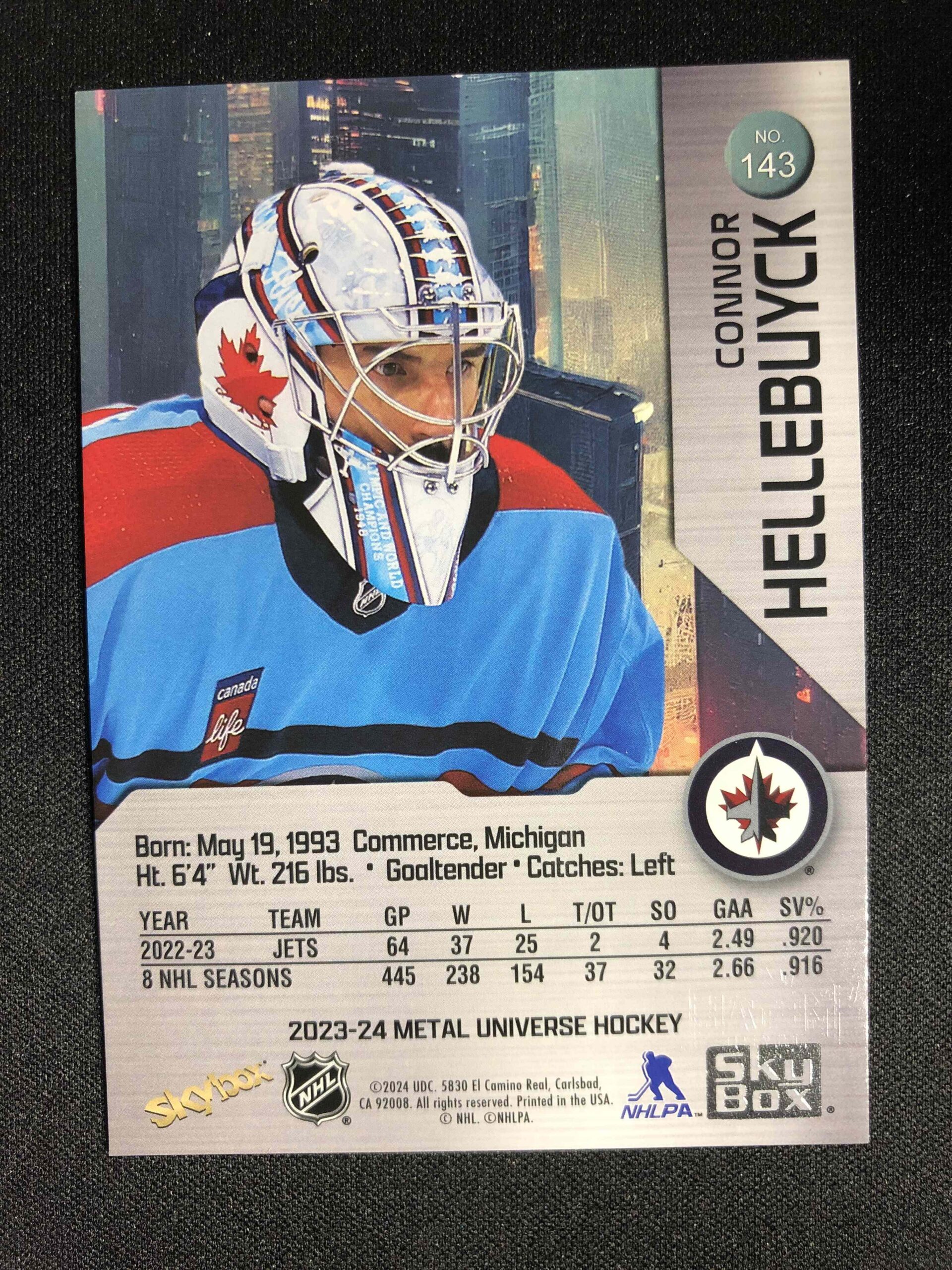 2023/2024 Upper Deck Skybox Metal Universe Base 143 Connor Hellebuyck - Obrázek 2